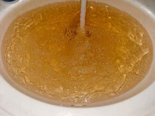 Why is My Water Brown? Is it Safe or Harmful? - Amarco Plumbing